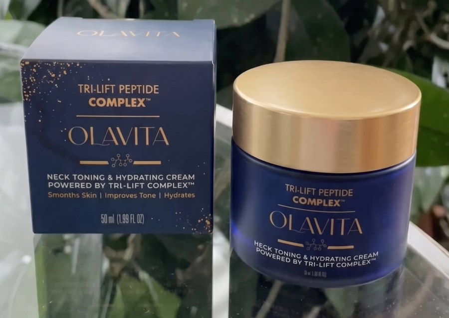 The Olavita Tri-Lift Peptide Complex jar beside its navy and gold box